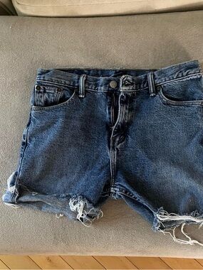 Levi's Distressed Dark Blue Denim Cutoff Shorts
